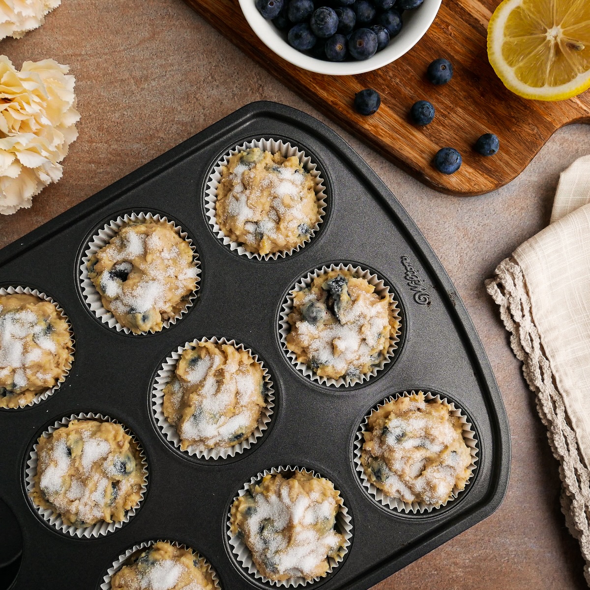sugar-on-muffins.jpg Granulated sugar sprinkled on top of muffins.