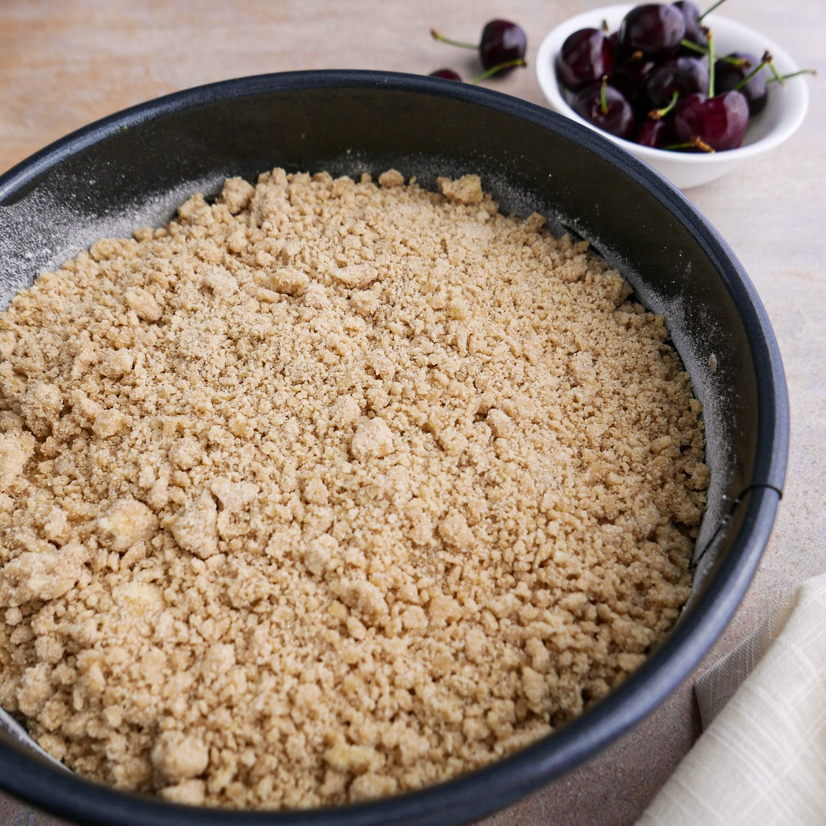 Streusel topping spread on top of cake batter.