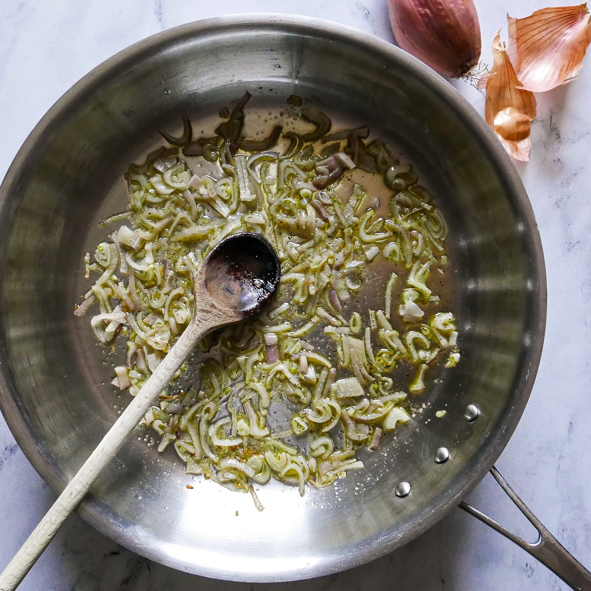 Sauteed shallots in olive oil.