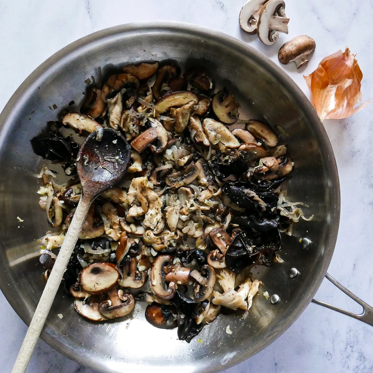 Cooked cremini mushrooms added to shallot mixture. 