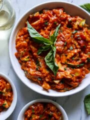 Creamy one pot vegetarian pasta in a large bowl with spoon.