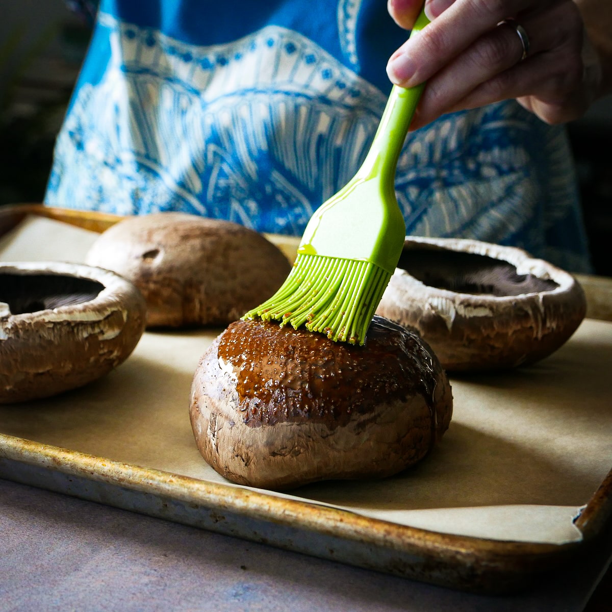 chewy-snickerdoodles.jpg Brushing spice mixture onto portobello mushrooms.