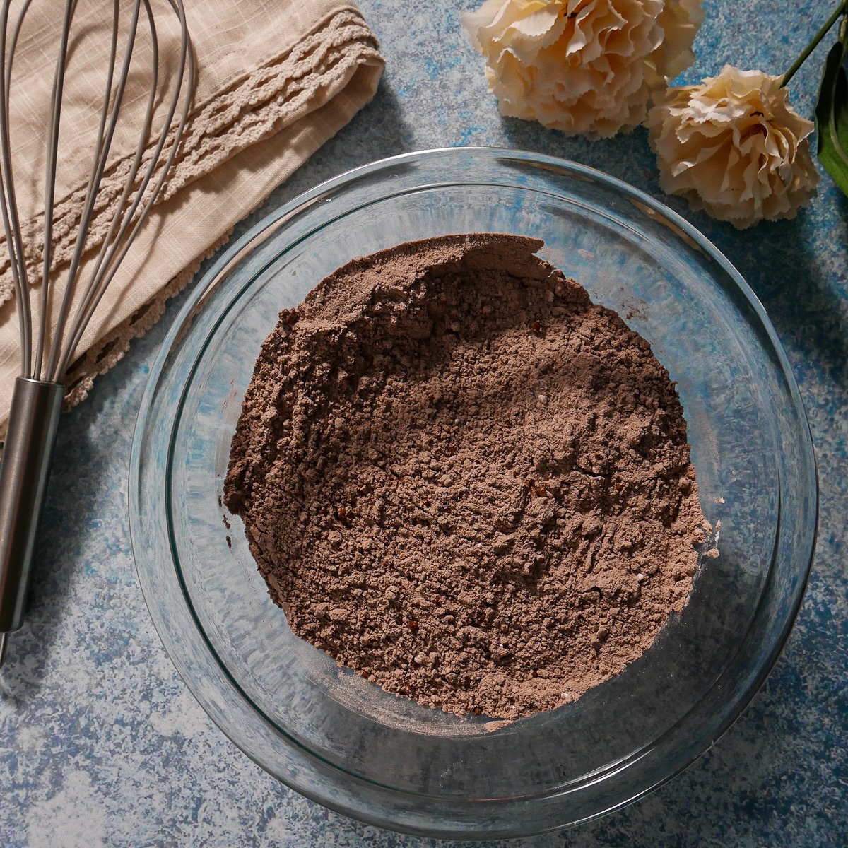 Dry ingredients whisked together in a bowl.