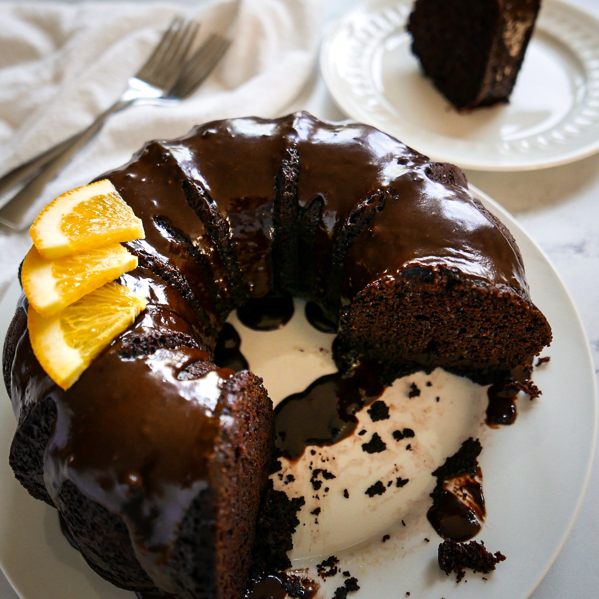 chocolate cake with orange drizzled with a chocolate glaze.