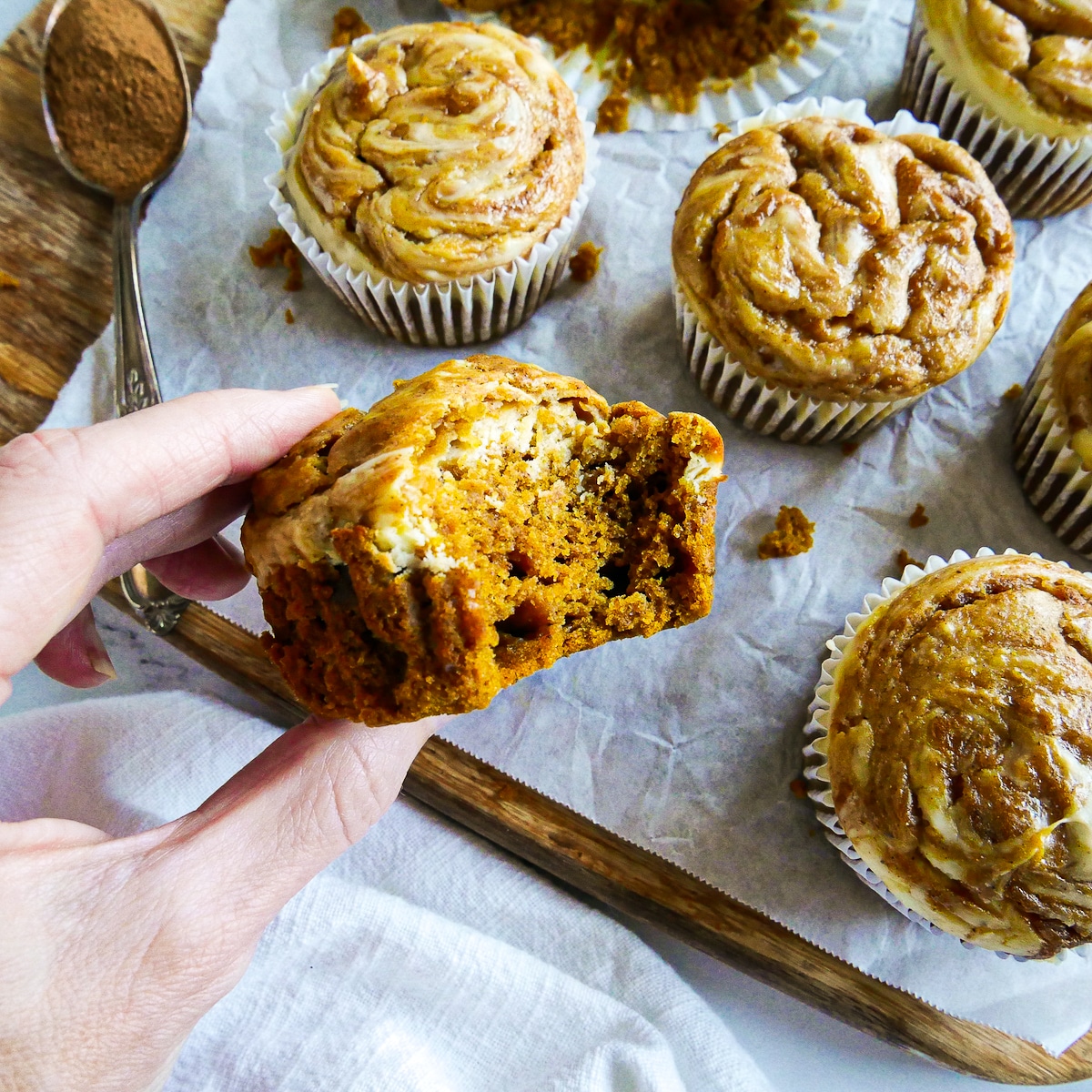 muffin-cut-in-half.jpg Pumpkin muffins with cream cheese that's been cut in half.