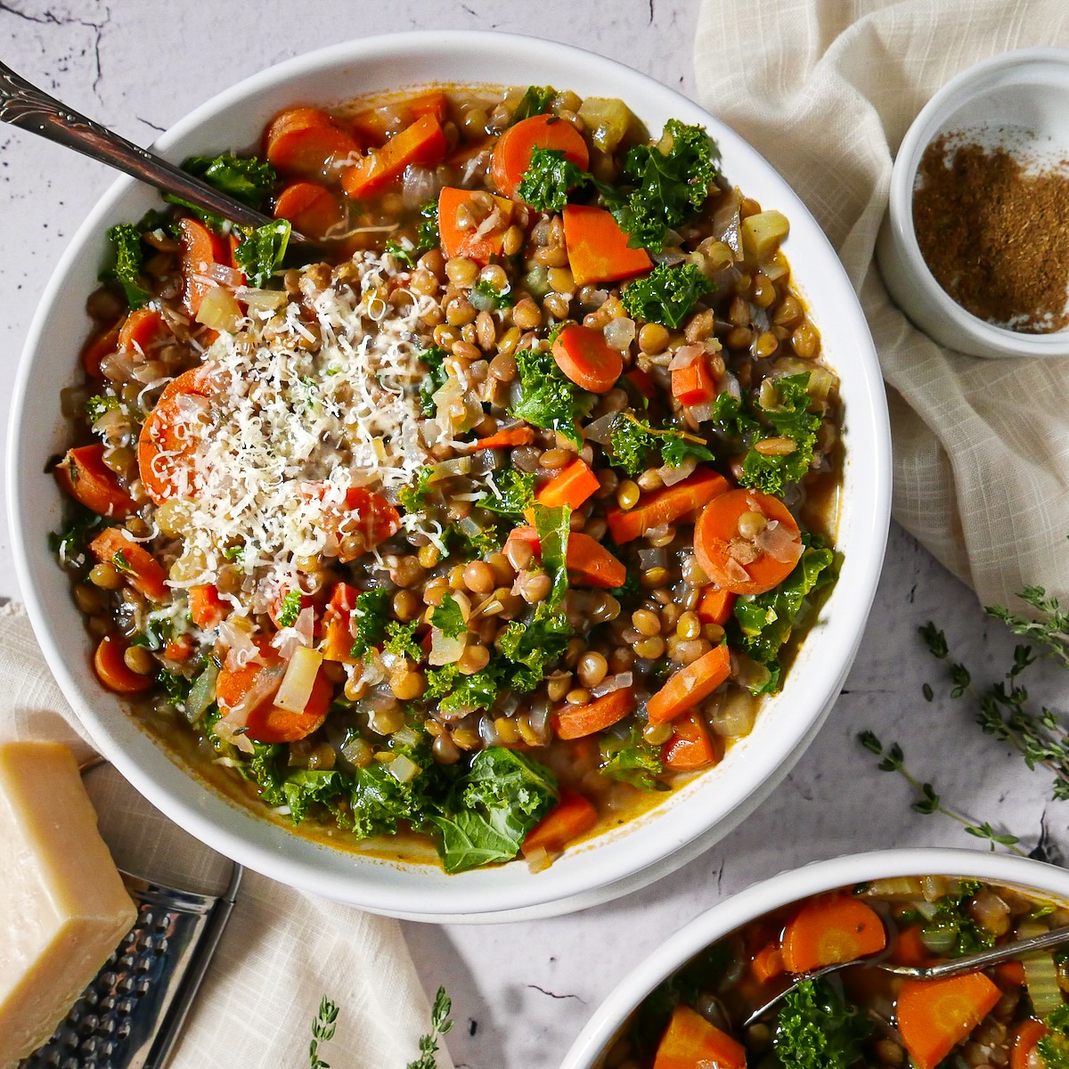 Lentil and vegetable soup served in a bowl.