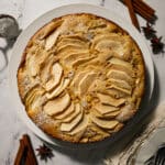 Easy apple cake served on a platter.