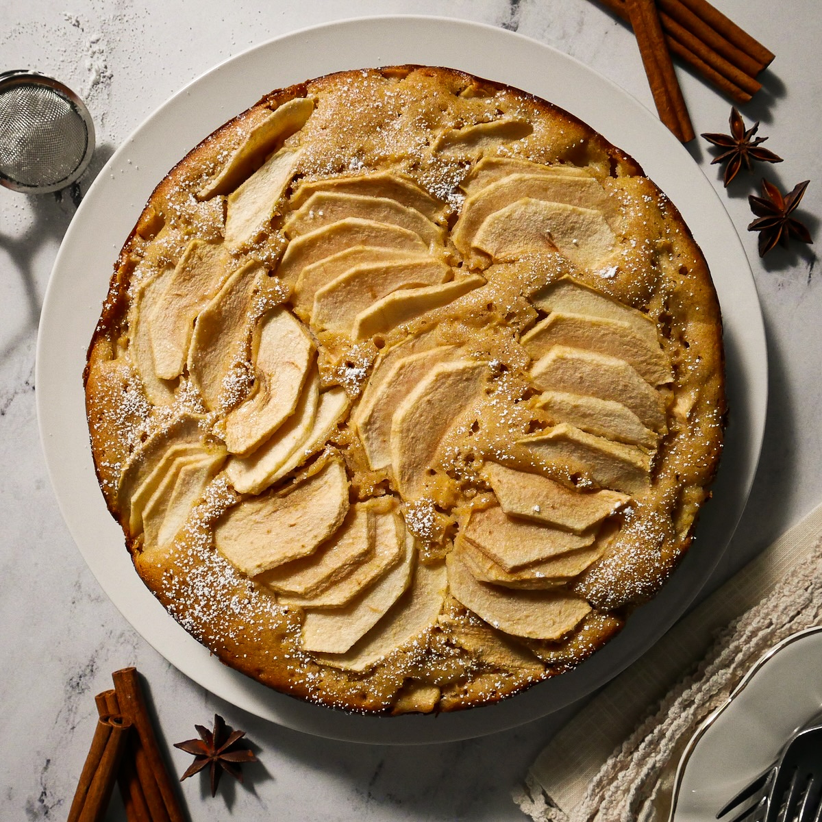 apple-cake.jpg Easy apple cake served on a platter.