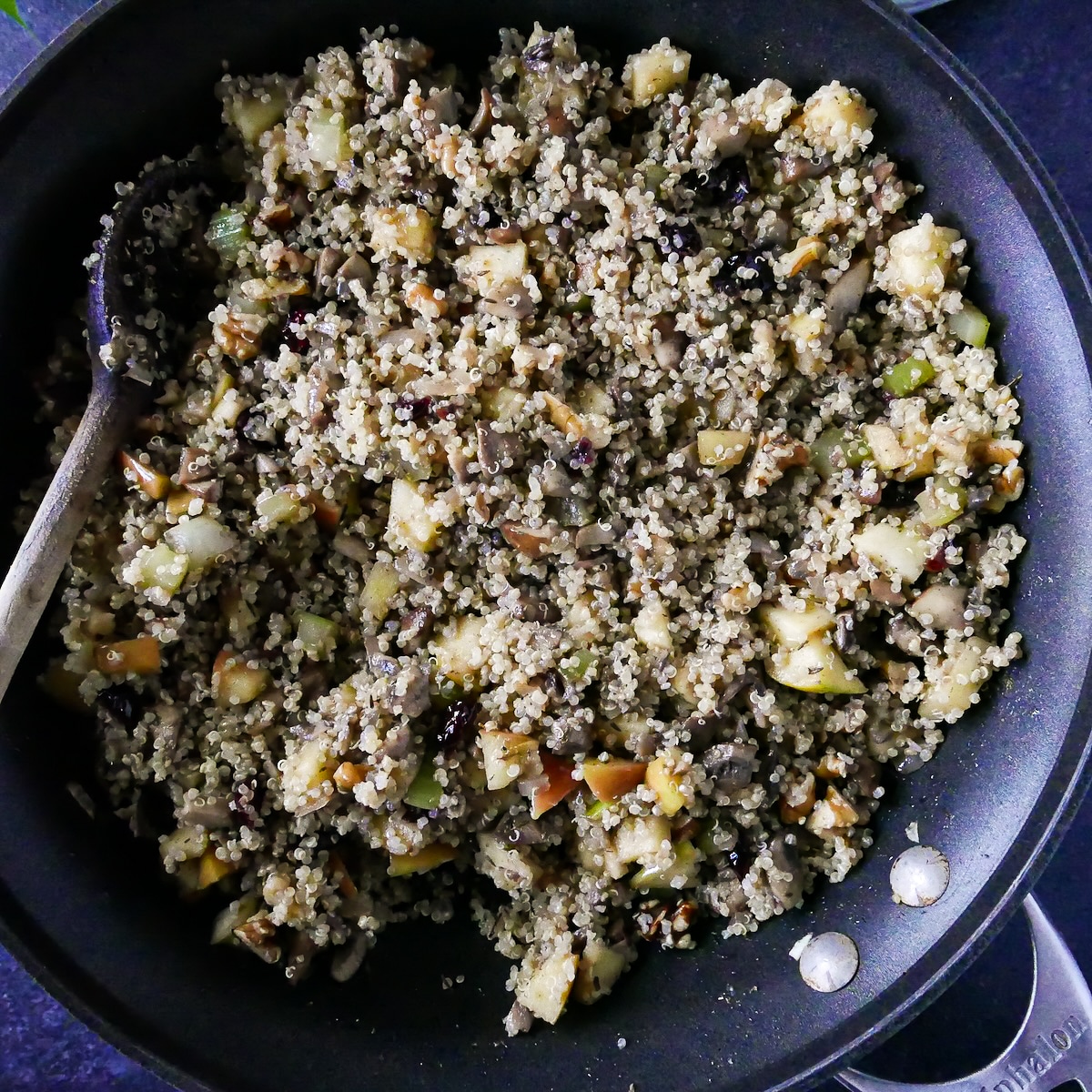Quinoa and walnuts added to vegetable mixture.