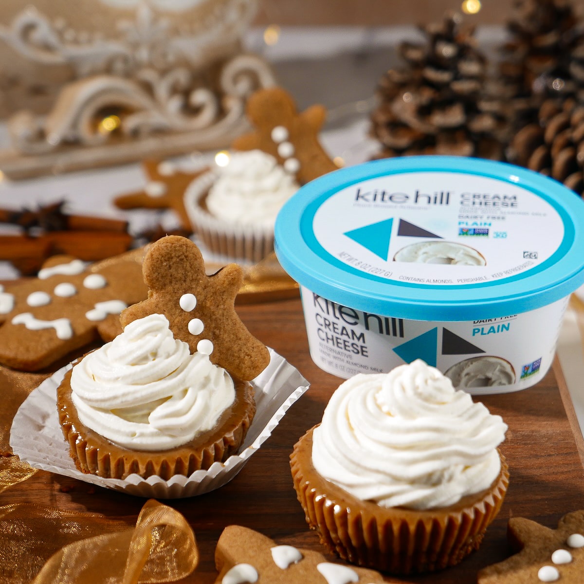 cheesecakes.jpg Mini gingerbread cheesecakes topped with whipped cream.