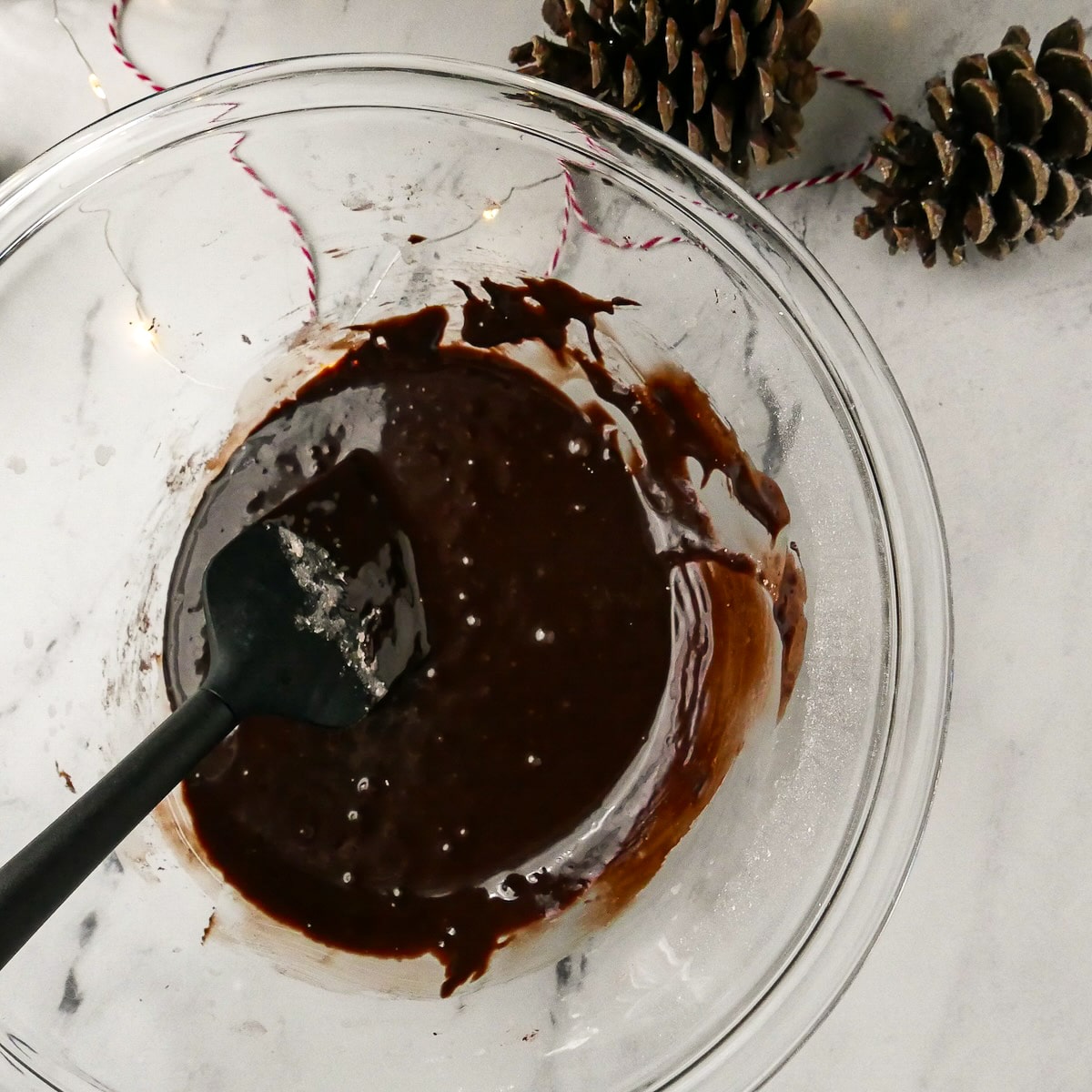 corn-syrup-and-rum.jpg Spiced rum and light corn syrup mixed together in a bowl.