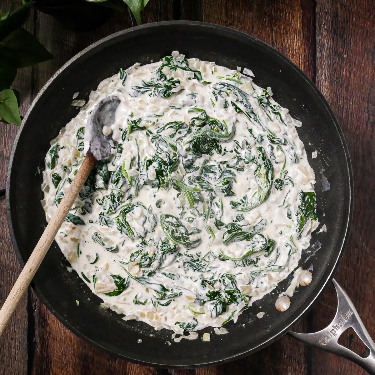 heavy cream and sour cream added to spinach-onion mixture.