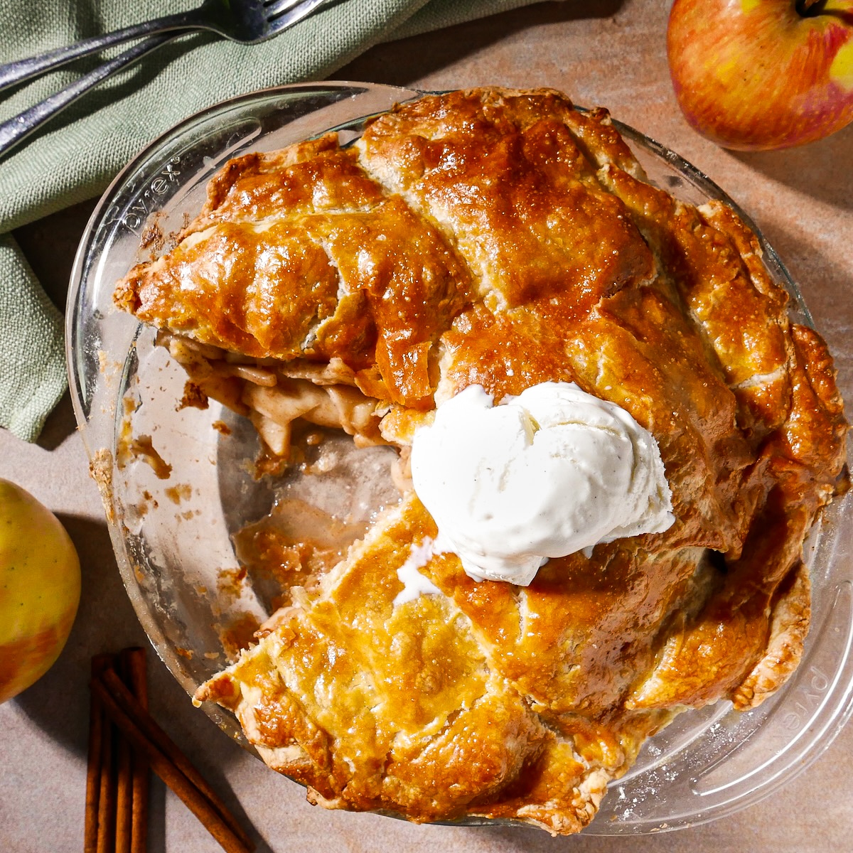 apple-pie.jpg Puff pastry apple pie with a scoop of ice cream on top.