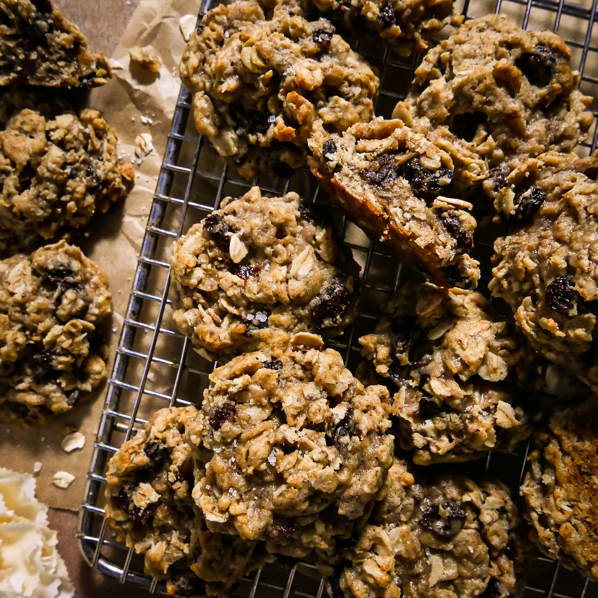 homemade-cookies.jpg Homemade vegan cookies with oatmeal and raisin on a cooling rack.