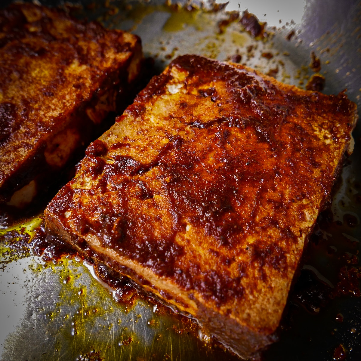 tofu-in-bbq-sauce.jpg Tofu slathered in bbq sauce in skillet.