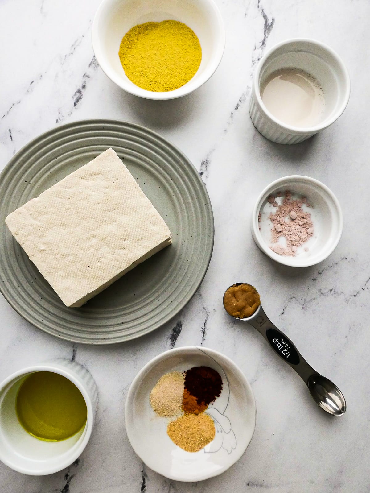 Tofu scramble ingredients arranged on a table.