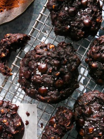 Healthy chocolate cookies arranged on a cooling rack.