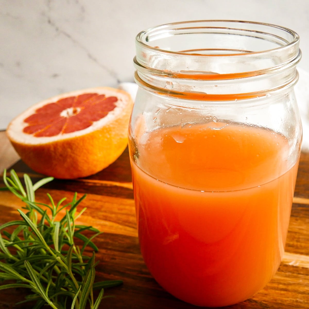 vodka and grapefruit juice in a container after being shaken. 