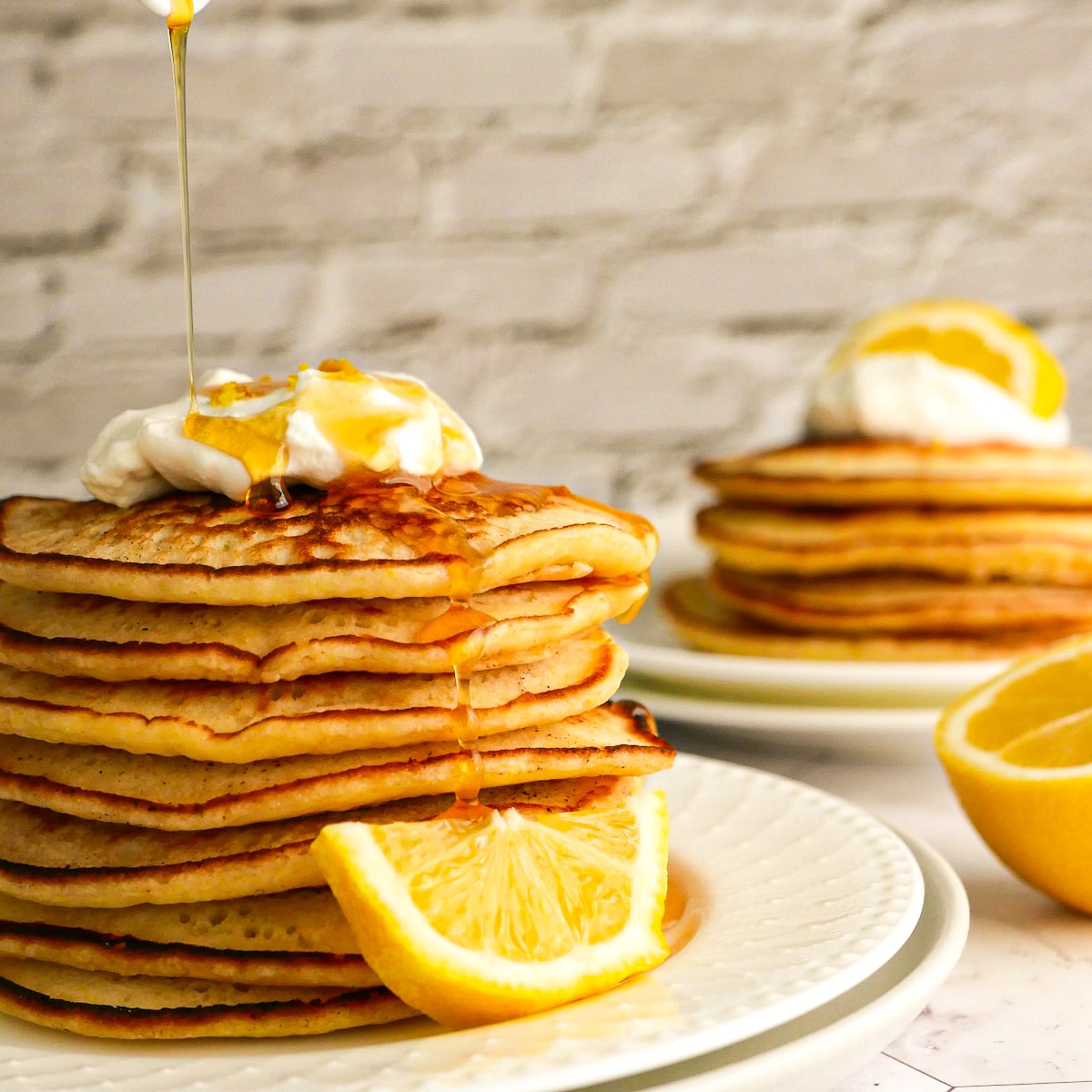 stack-of-pancakes.jpg Pouring syrup on a stack of fluffy pancakes.