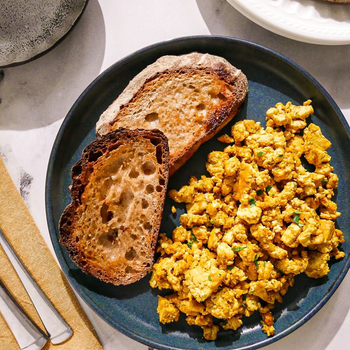 tofu-scrambled-eggs.jpg Creamy tofu scramble with toast.