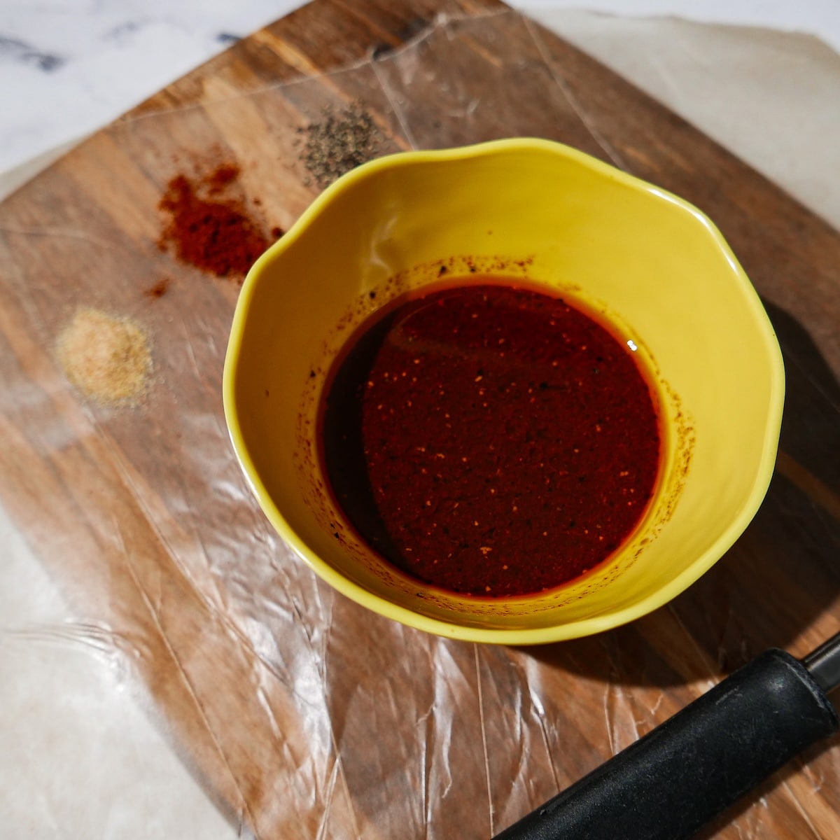 mushroom-marinade.jpg Marinade for mushrooms in a small bowl.