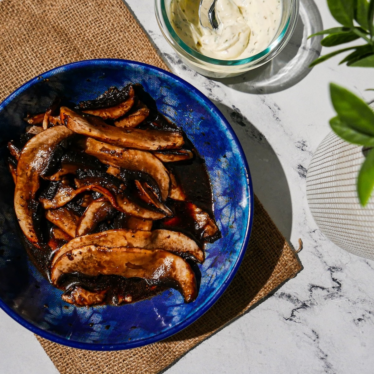 marinating-mushrooms.jpg Sliced mushrooms marinating in bowl.