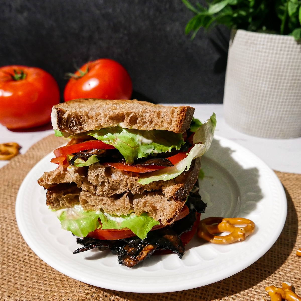 vegan-blt.jpg Assembled vegan blt with mushrooms on a plate.