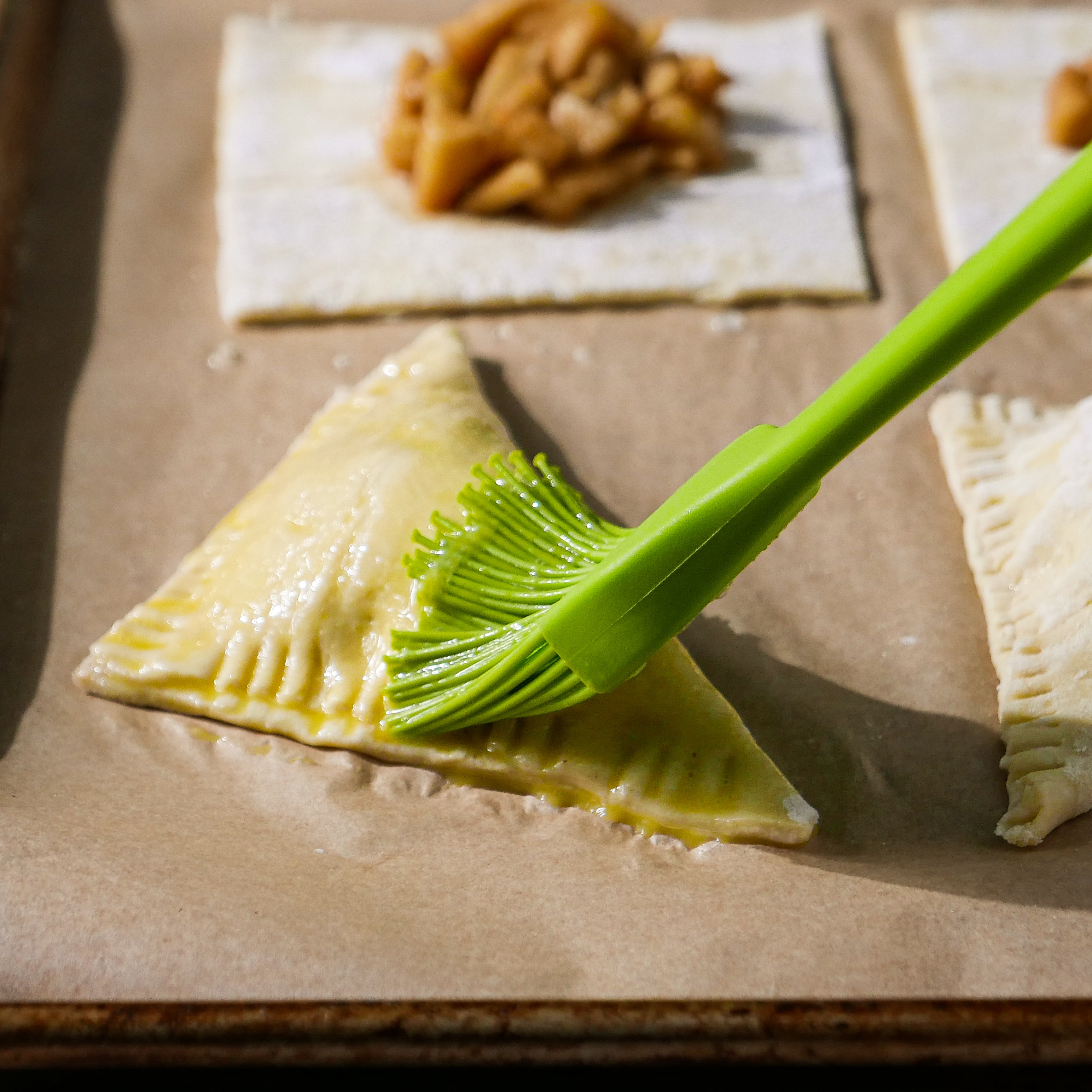 egg-wash-on-turnovers.jpg Brushing egg wash on turnovers.