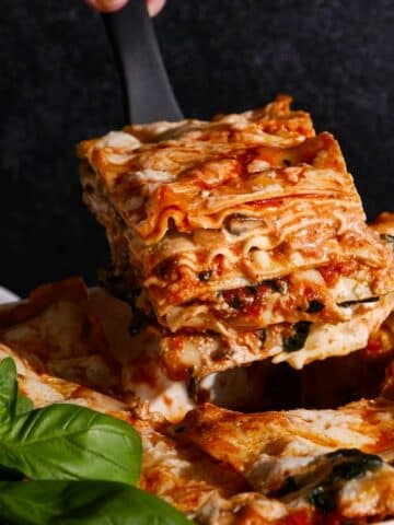 Cheesy lasagna with mushrooms and zucchini.
