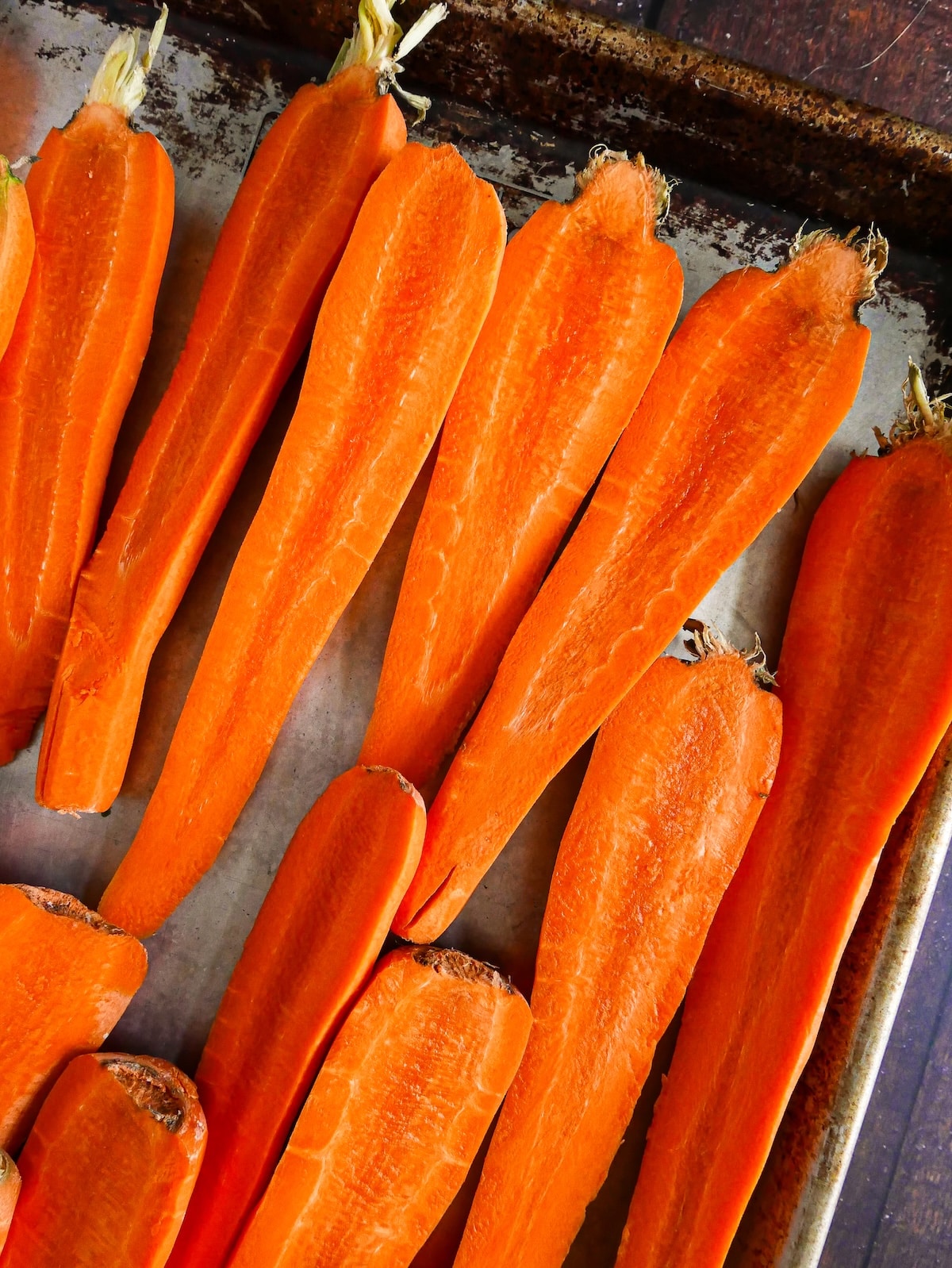 halved-carrots.jpg Whole carrots sliced in half lengthwise.