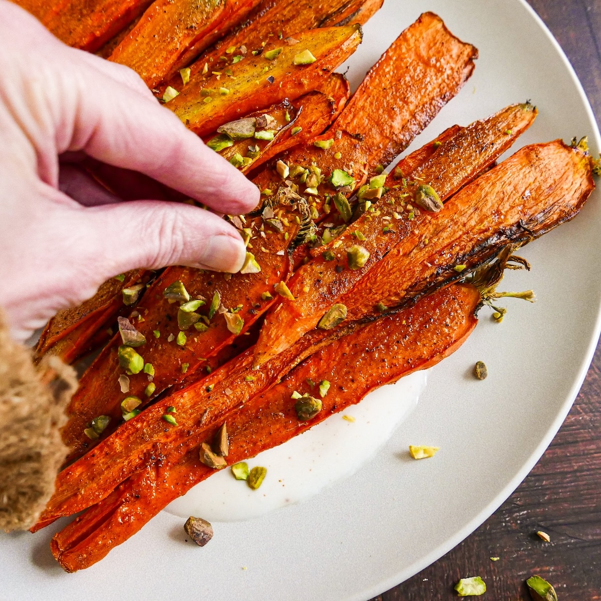 pistachios-on-carrots.jpg Sprinkling roasted carrots with chopped pistachios.