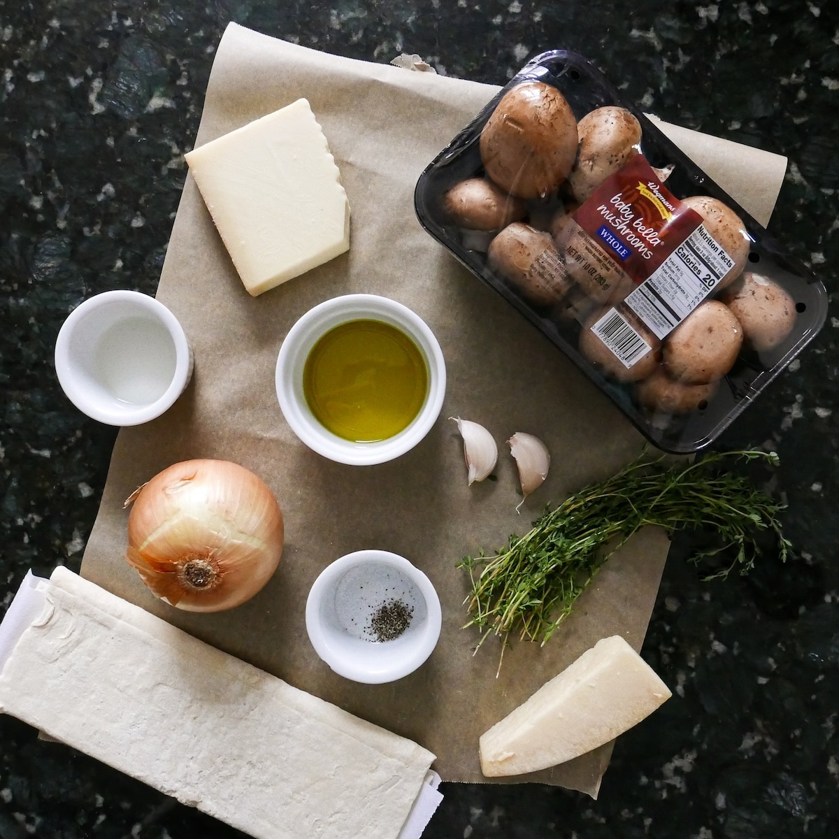 mushroom-tart-ingredients.jpg Mushroom tart ingredients arranged on a table.