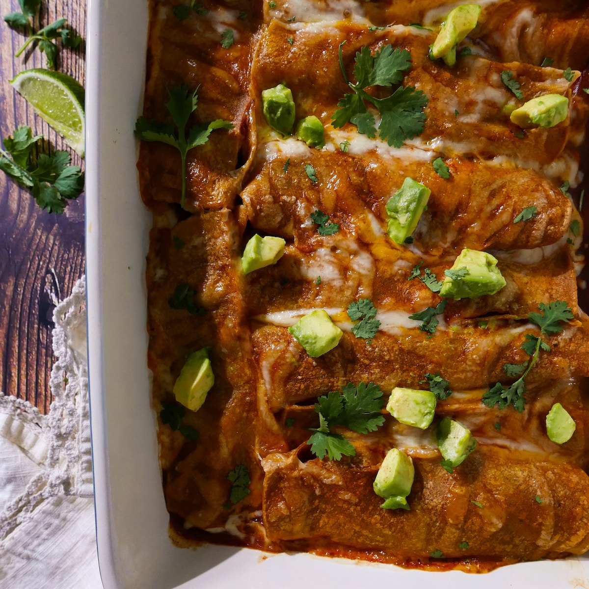 veg-enchiladas.jpg Healthy sweet potato enchiladas with enchilada sauce.