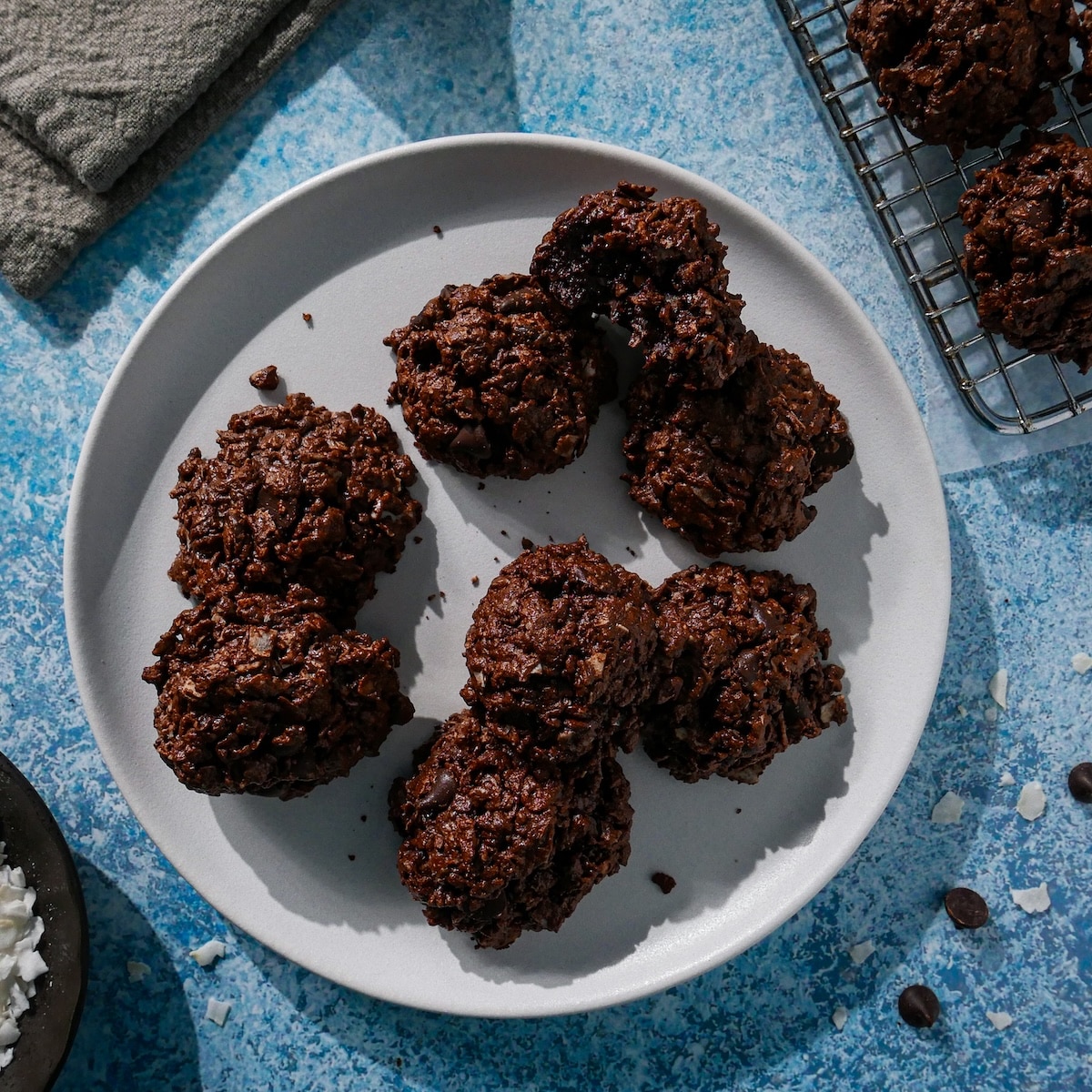 Plate of chewy chocolate coconut macaroons on a plate.