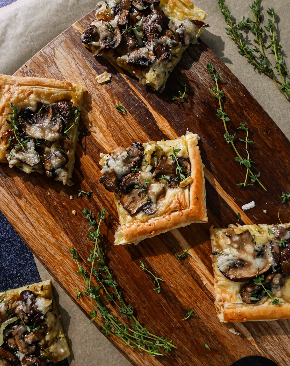 cheesy-mushroom-tart.jpg Cheesy mushroom tart puff pastry with thyme, garlic, and caramelized onions.