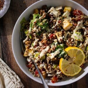 Vegan quinoa bowl recipe with tahini dressing.
