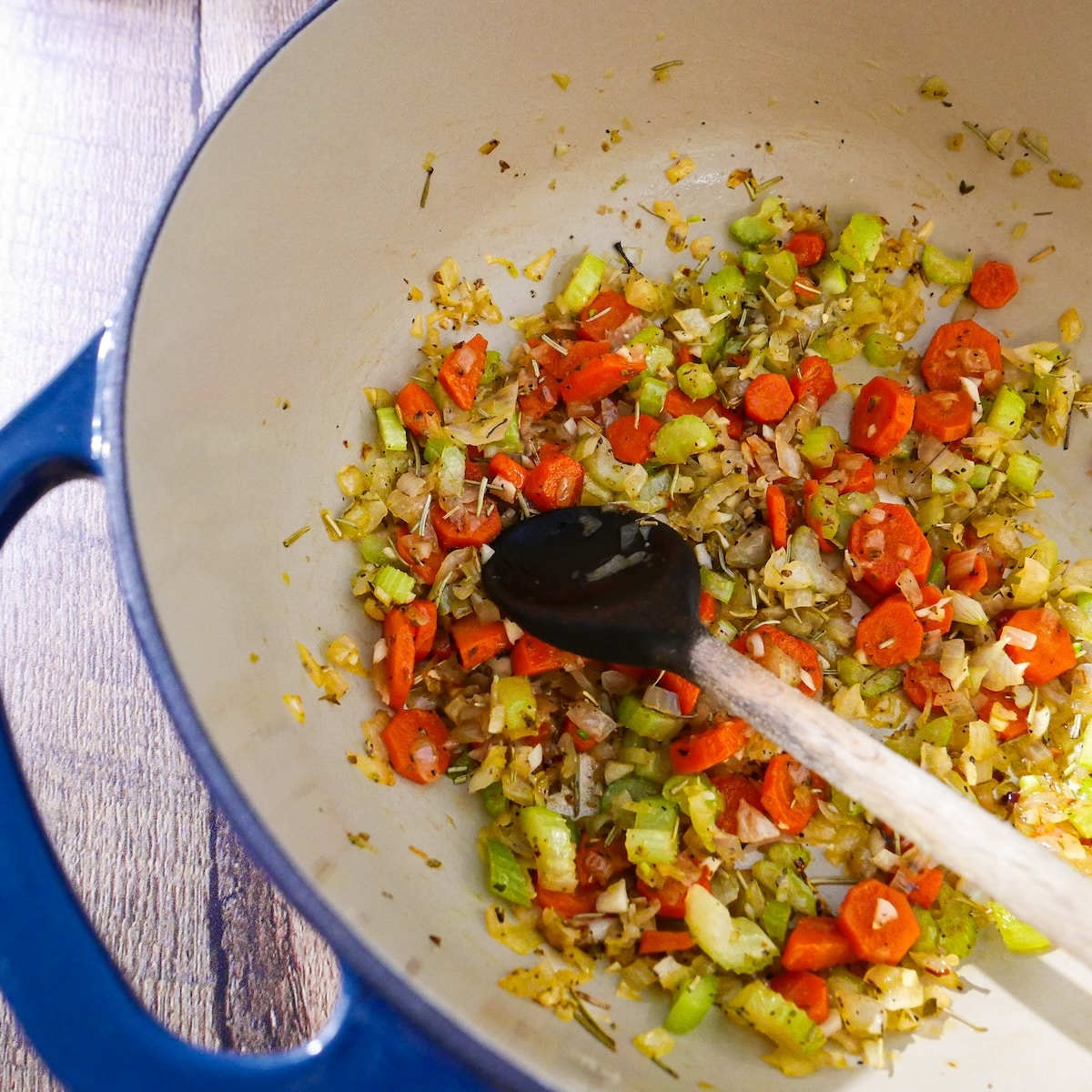ingredients-in-pot.jpg Onion, carrots, celery, and spices added to large pot.