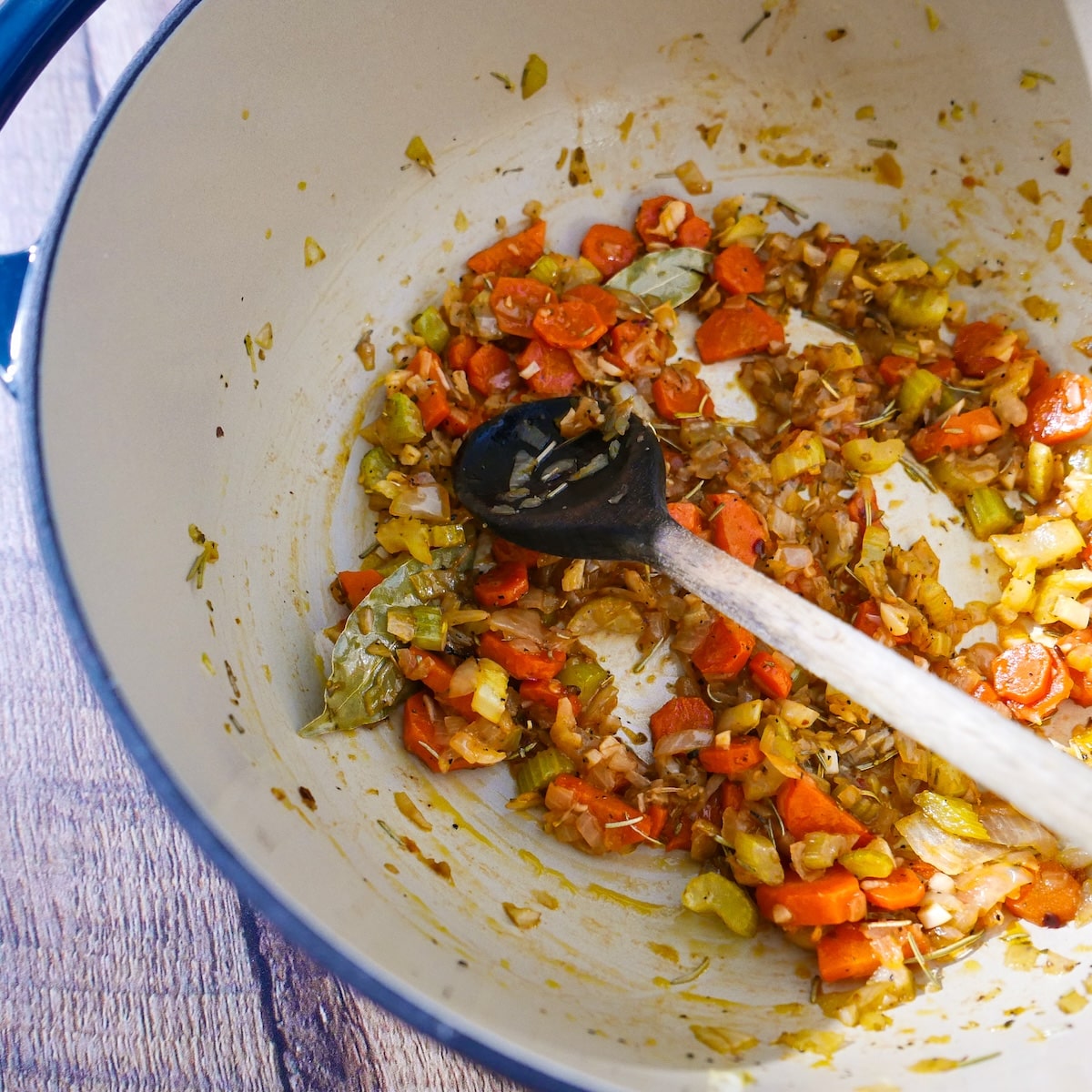 tomato-paste-and-white-wine.jpg Tomato paste and white wine added to soup mixture.