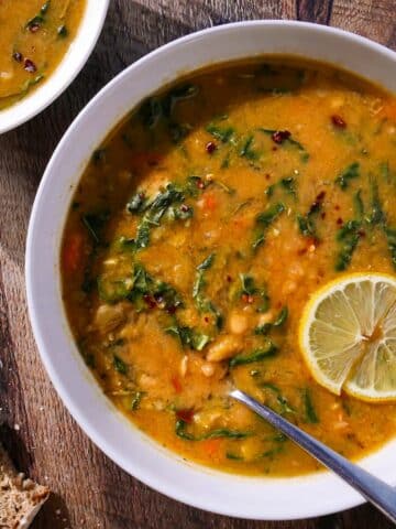 Easy kale and white bean soup in a bowl.