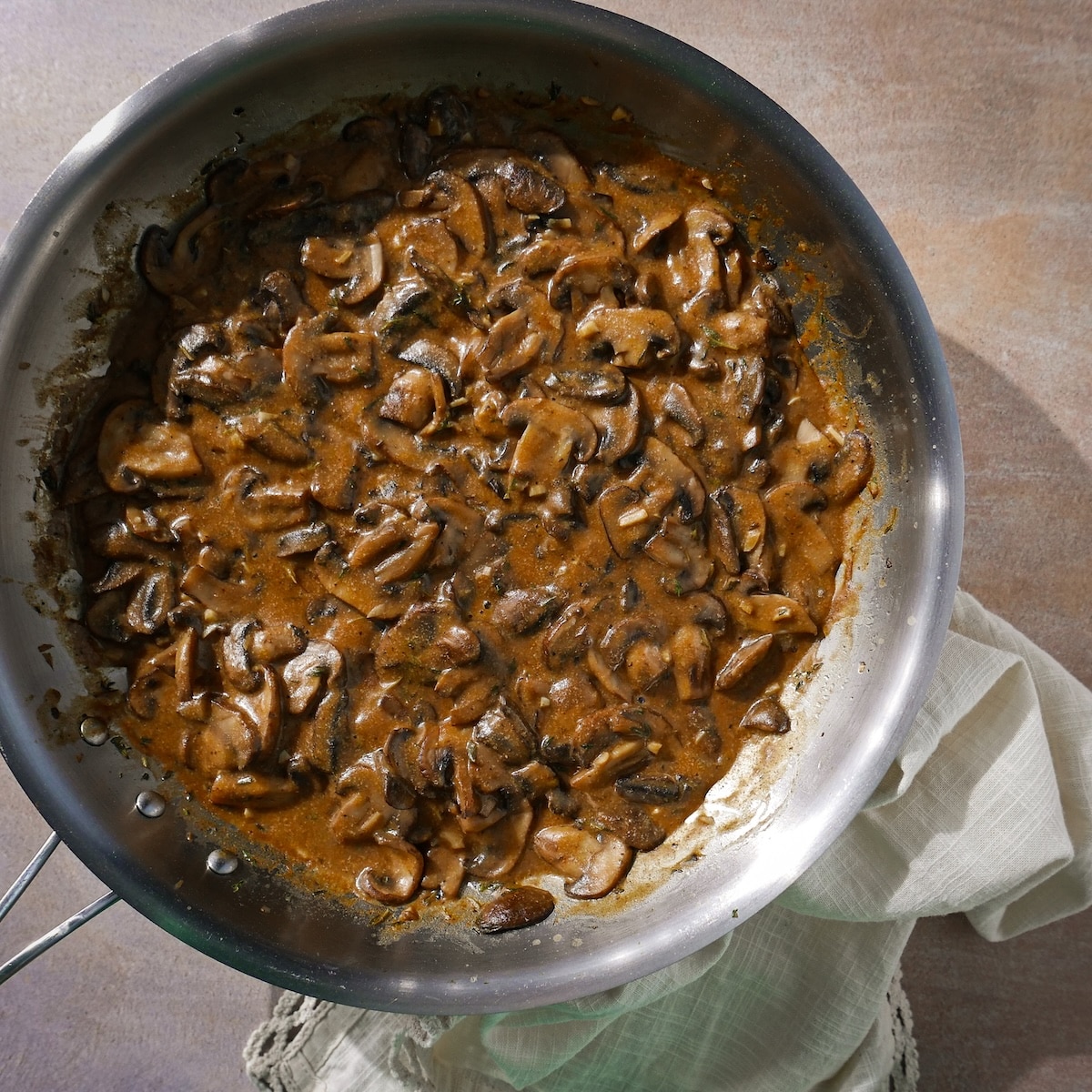 sauteing-mushrooms.jpg Cooking mushrooms with broth, nutritional yeast, and spices.
