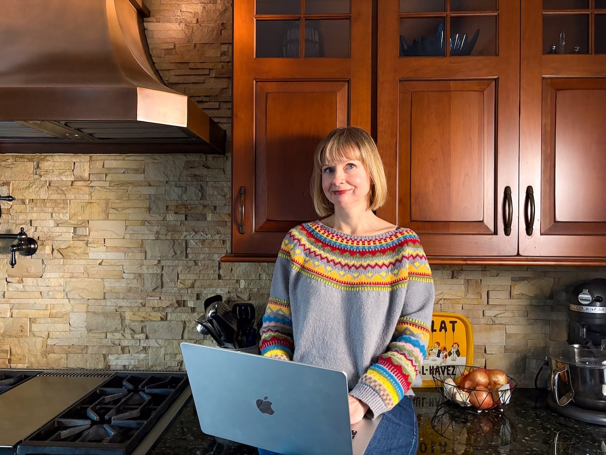 MaryAnne working in her kitchen.