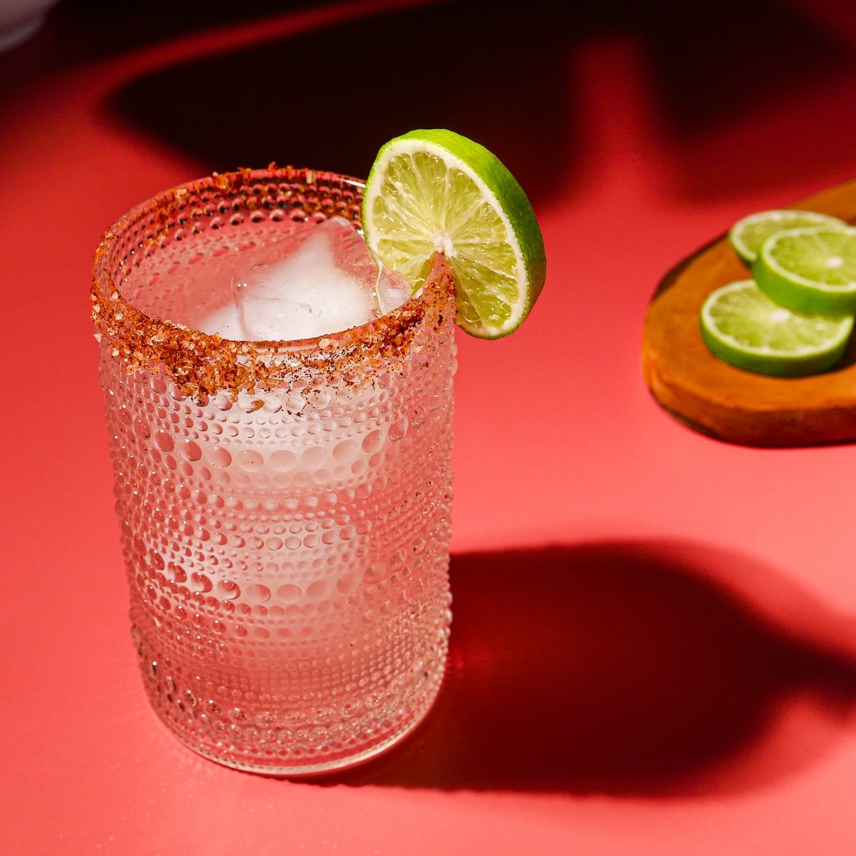 pink-cocktail.jpg Pink cocktail with salt rim and slice of lime.
