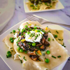 Easy wonton ravioli on a plate with a fork.