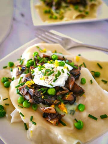 Easy wonton ravioli on a plate with a fork.