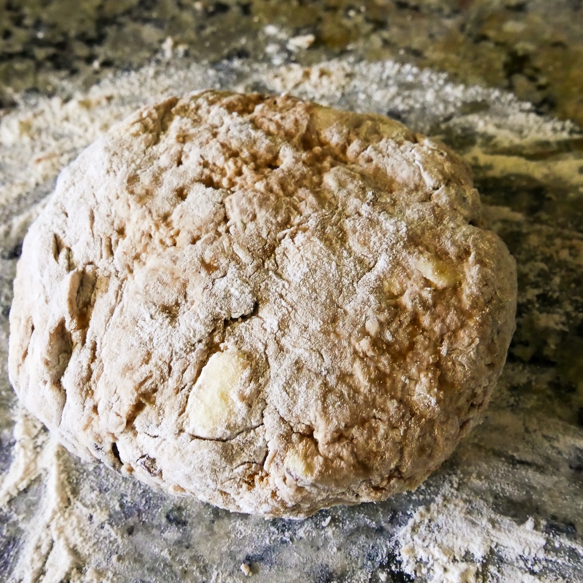 dough-placed-on-counter.jpg combined dough turned out onto the counter.