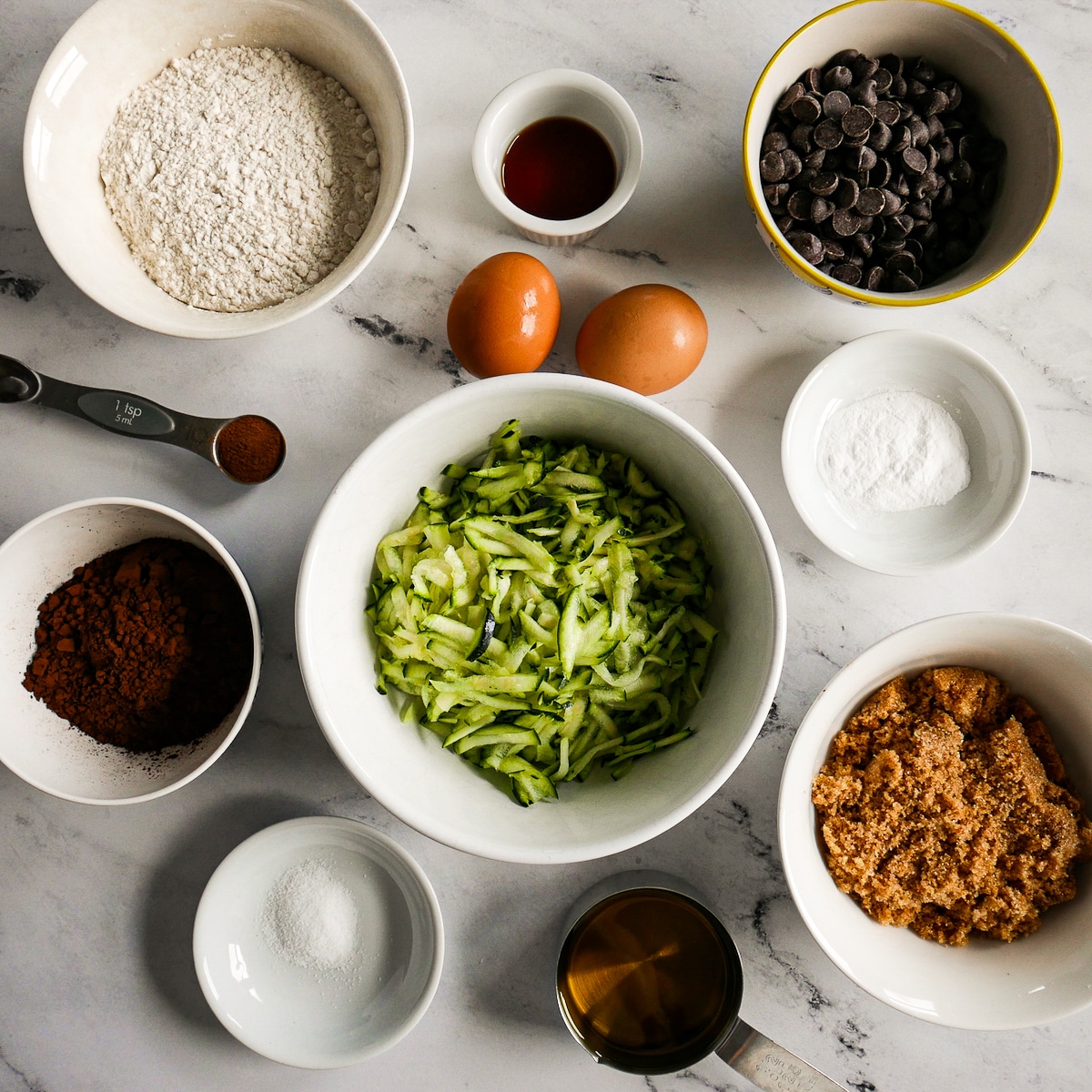 ingredients.jpg Chocolate zucchini bread ingredients on a table.