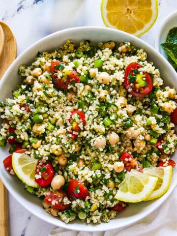 Quinoa tabouli salad with chickpeas and fresh herbs.