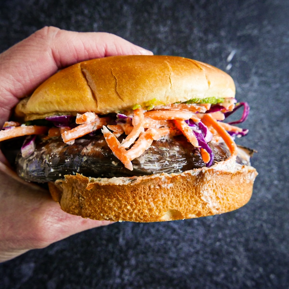 portobello-mushroom-burger.jpg Pan fried portobello mushroom burger with creamy ranch slaw.