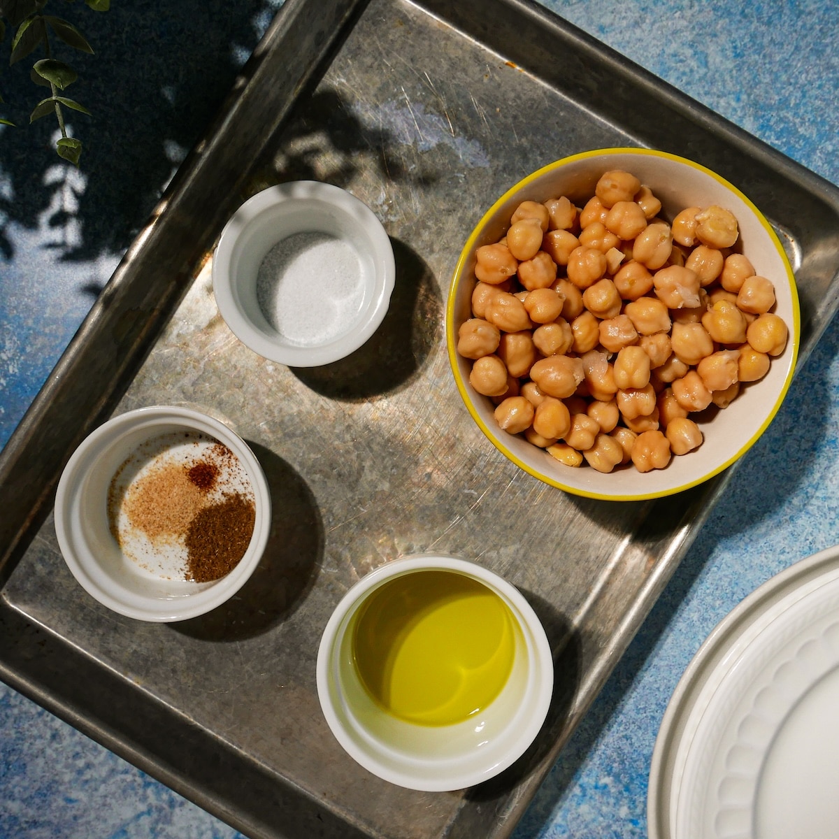 roasted-chickpea-ingredients.jpg Roasted chickpea ingredients on a baking sheet.