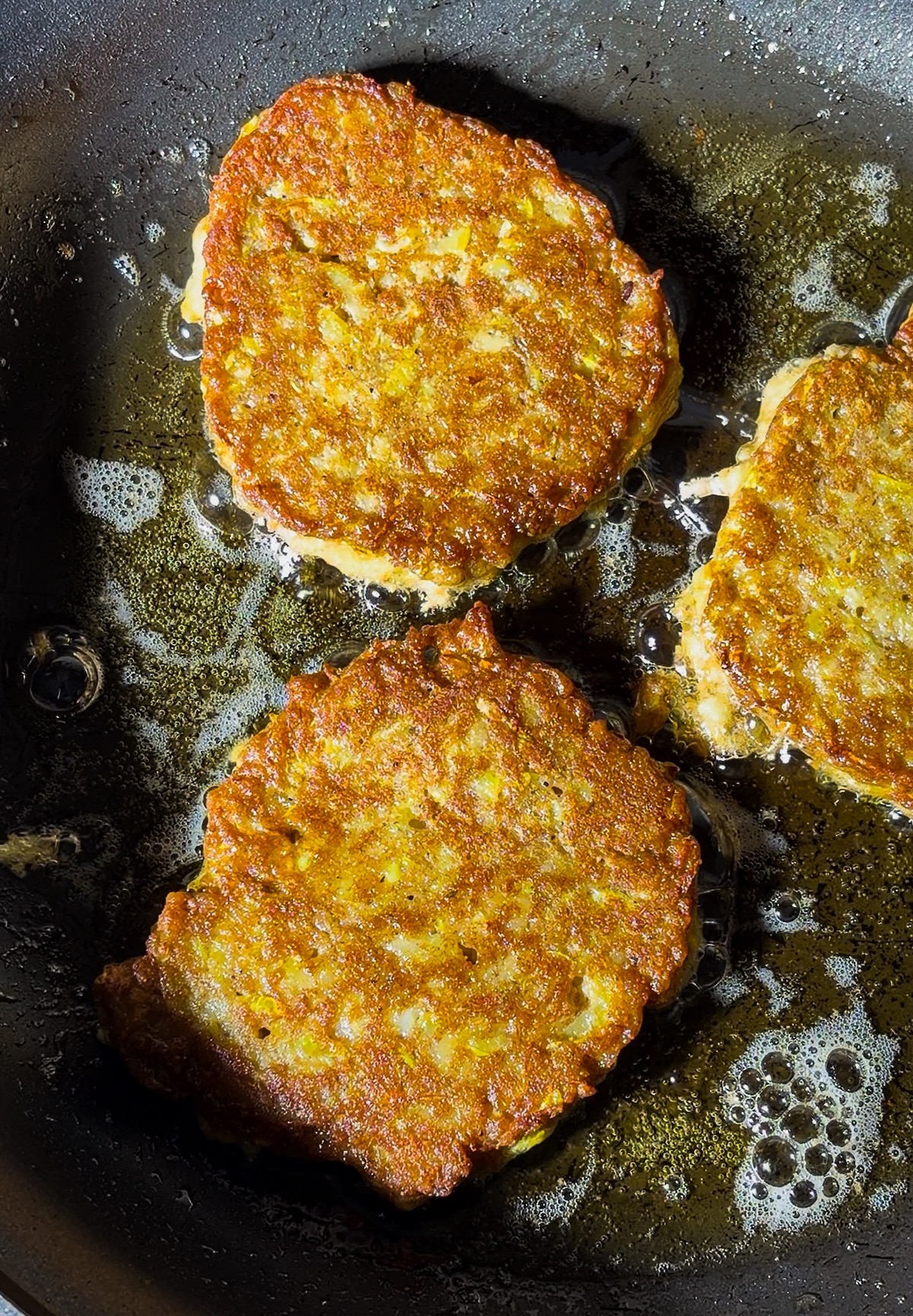 Crispy zucchini fritters with feta and dill.